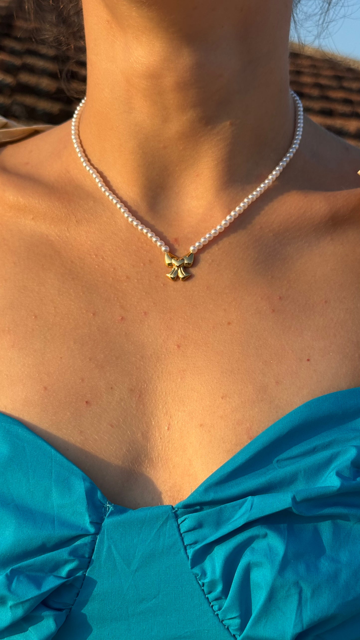 COLLANA FIOCCO PERLE