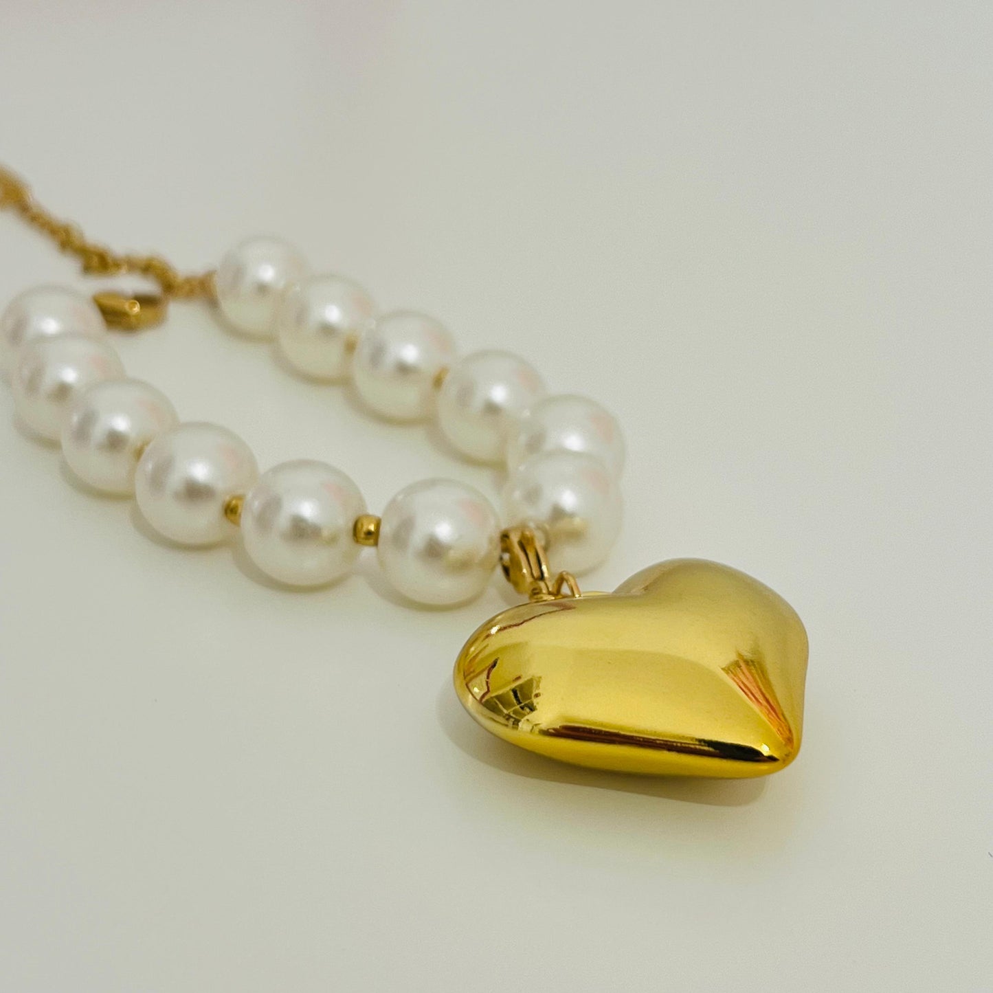 BRACCIALE CUORE PERLE