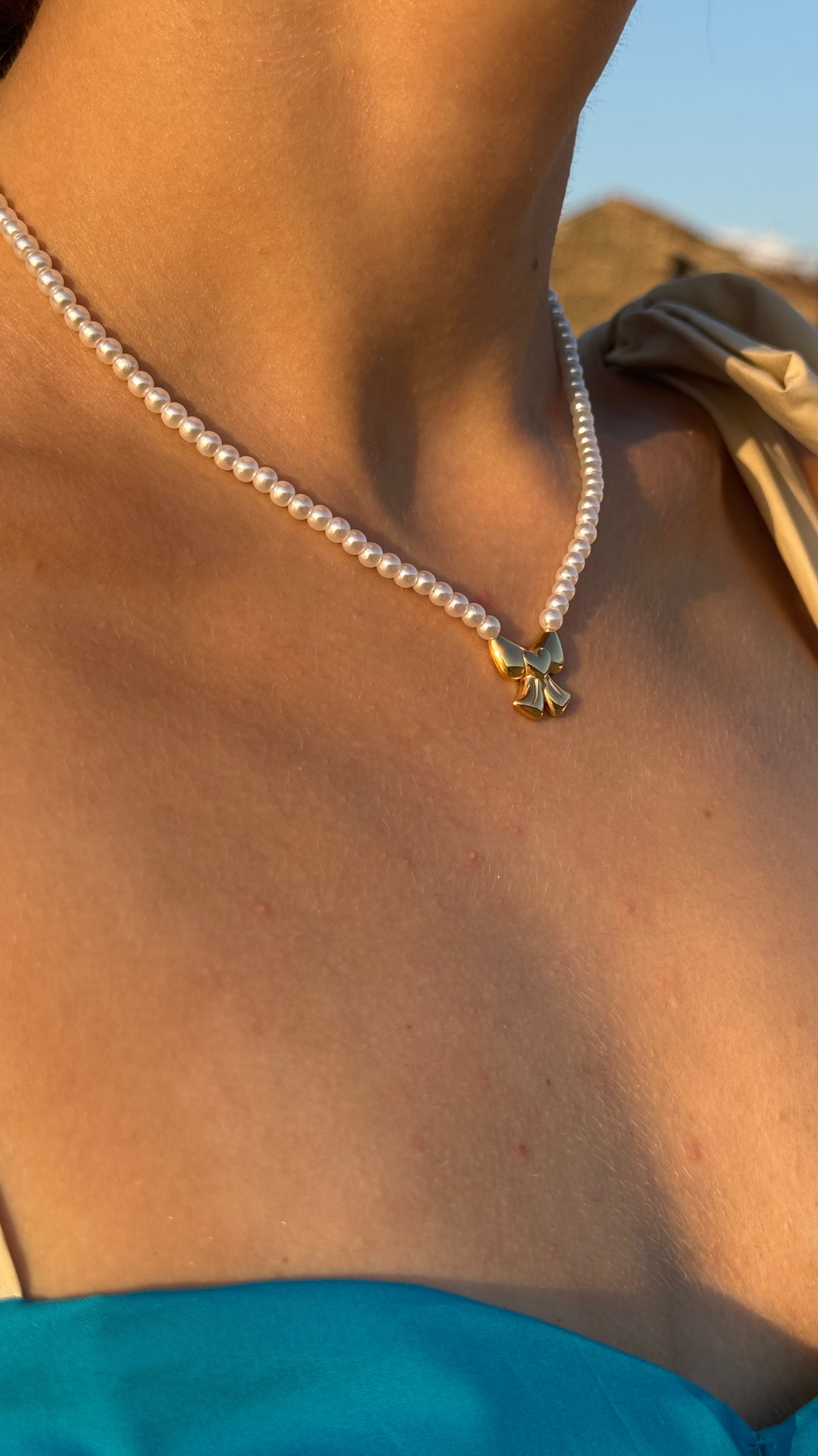 COLLANA FIOCCO PERLE